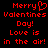 Red pixelated text on black background reads 'Merry Valentines Day! Love is in the air!' with a heart symbol replacing the 'o' in 'Merry'.
