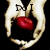 Two hands hold a red apple against black background; text above changes across frames.