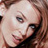 Pixelated close-up of a person's face with visible eye, nose, and mouth features in warm tones.