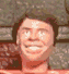 A person with dark hair and a light skin tone displays six distinct facial expressions across two of three each