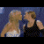 Animated contact sheet showing seven sequential frames of two women kissing, with visible pixelation and blue background.