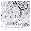Pixelated winter scene with snow-covered trees and a house, text reading 'Winter wonderland' at the bottom.