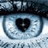 Pixelated close-up of two large blue eyes with heart-shaped pupils, framed by dark eyelashes and light skin tones.