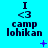 A static image with a bright cyan background displays three of identical text and symbols: 'I <3 camp lohikan' in dark blue pixelated font, with small purple plus and star symbols scattered around