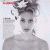 A grayscale pixelated image of a person with elaborate updo hairstyle and dark lipstick, next to green text reading 'Original Icons .com' on black background.