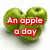 Green apples arranged in a heart shape with red text reading 'An apple a day' on white background.
