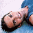 A split-frame contact sheet showing a pixelated image of a person lying down on the left and green text reading "Original Icons .com" on a dark green background on the right.