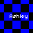 Blue and black checkered background with four instances of the name 'Ashley' in white pixelated text, arranged in a pattern