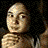 Animated sequence showing a character holding a glowing object with flame-like effects and text reading "Labyrinth" in