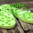 Green pixelated icons with white and green square patterns on a brown textured background, displaying the text 'aoife' in green above them.