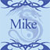 Light blue background with dark blue decorative border elements and a central circular design containing the text 'Mike' in dark blue letters.