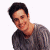 A pixelated image of a person in a gray shirt against white background, next to green text reading 'Original Icons .com' on dark green.