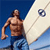 Static pixelated image of a shirtless man holding a surfboard against a blue sky background.