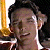 A pixelated image of a person with dark hair and light skin, alongside green text reading 'Original Icons .com' on a solid background.