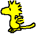 Yellow cartoon dragon with spiky head, winged body, and tail in walking cycle animation on gray background.