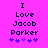 Pixelated text on bright pink background with purple and blue heart symbols below.