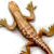 Pixelated figure in dynamic pose with limbs extended, rendered in brown and tan tones against a white background.