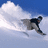 Pixelated image of a person skiing with snow spray against blue sky, accompanied by fragmented text "This is The life" on black background.