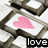 A pixelated image of a keyboard with two adjacent keys showing pink heart symbols, and text reading 'love button!' below.