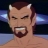 Pixelated close-up of a character with brown hair, small white horns, a goatee, and a wide open mouth showing teeth against a dark blue background.