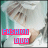 A pixelated image of a person with light brown hair and closed eyes, wearing a white top against a teal background.
