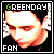 Pixelated image of a person with dark hair wearing black clothing, text 'GREENDAY' and 'FAN' visible above and below the figure.