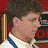 A 48x48 pixel animated contact sheet showing three frames of a character from Arrested Development, with text and a red house icon below the characters.