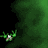 Animated green cartoon creature with multiple limbs and a large mouth, transitioning from small to large size across six frames on dark background.