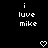 Black background with white pixelated text reading 'i luve mike' in two and a small heart symbol below each