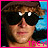 A pixelated image of a person with brown hair and black sunglasses, wearing a brown cap, with the name 'TREY' below, surrounded by a pink border.
