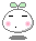 Pixelated white rounded character with green sprout top, pink cheeks, black horizontal eyes, and small black mouth on gray background.