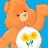 A pixelated orange Care Bear with a white belly patch featuring yellow flowers, next to "Care Bears" text and "83002 TOFC" on a blue background.