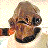 Pixelated image of a person with brown hair and dark clothing, next to bold black text reading "It's a Trap!!" on white background.