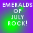 Pixelated text "EMERALDS OF JULY ROCK!" on a purple and green gradient background with subtle light effects.
