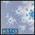 Animated snowflake pattern with changing text 'HINTER' in blue banner at bottom left, set against light blue background.