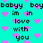 Pixelated cyan background with repeated pink hearts and black text reading "baby boy im in love with you" arranged in a pattern