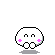 Pixelated white character with pink cheeks and closed eyes, transitioning to open mouth expressions while emitting colored sparkles.