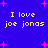 Blue background with yellow text reading "I love joe jonas" repeated four times, surrounded by pink star shapes.