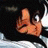 A pixelated contact sheet showing two frames of an animated AIM buddy icon featuring a character from Gunsmith Cats with visible text "Anime IM" and "GDM" on the right side.