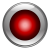 A circular red button with a metallic silver border and gradient shading, set against a light gray background.