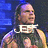 A four- shows a person with long hair in a sleeveless top against a blue brick background, with text overlays changing