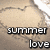 A heart-shaped sand drawing with text and symbols, showing a transition from 'summer love' to '<3'.