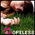 Animated contact sheet of a person lying on grass with repeated text and pink symbols, showing frame-by-frame motion changes in facial expression and body position.