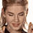 A 48x48 pixel animated contact sheet showing three sampled frames of a celebrity's face in different poses and expressions, arranged in a 2x2 grid with one empty cell.