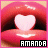 A close-up of pink lips with a white heart shape in the mouth, displaying 'AMANDA' text below.