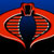 A pixelated red and blue icon with a central dark blue shape flanked by striped red sections, set against a blue background.