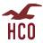 A static icon features a stylized red bird in flight above bold maroon letters 'HCO' on a light background.