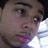 A person with dark hair and light skin appears in four -aligned , each showing a slightly different head angle and mouth position against a bright, blurred background