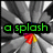 A pixelated animation with a radial gray background and green text reading 'a splash of color'
