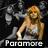 A static image featuring a woman with long blonde hair in a gray dress, a group of people, and a hand holding a red apple, with text labels 'Paramore' and 'Hayley Williams' visible.